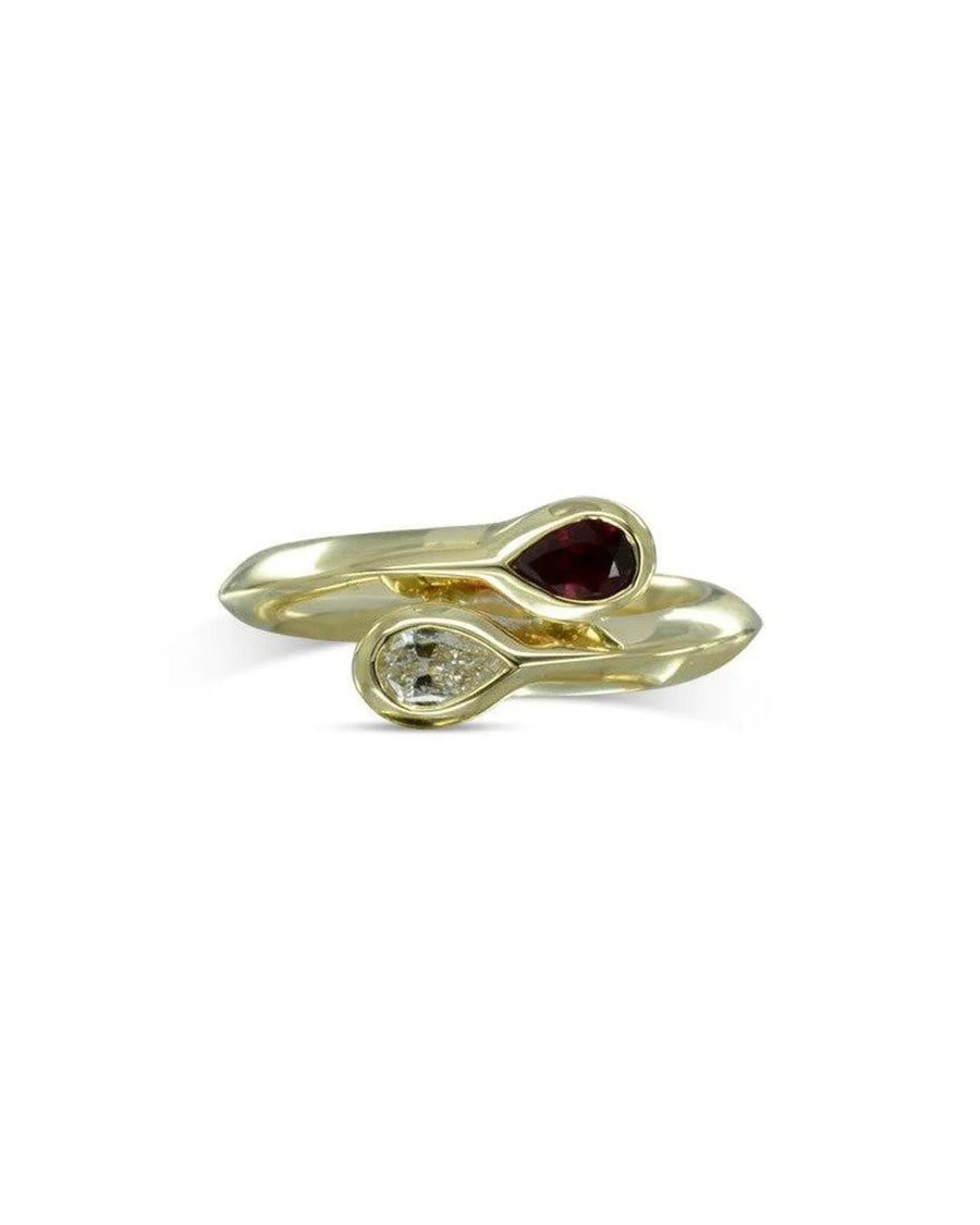 Gold Moi et Toi ring with pear-shaped red gemstone and diamond.