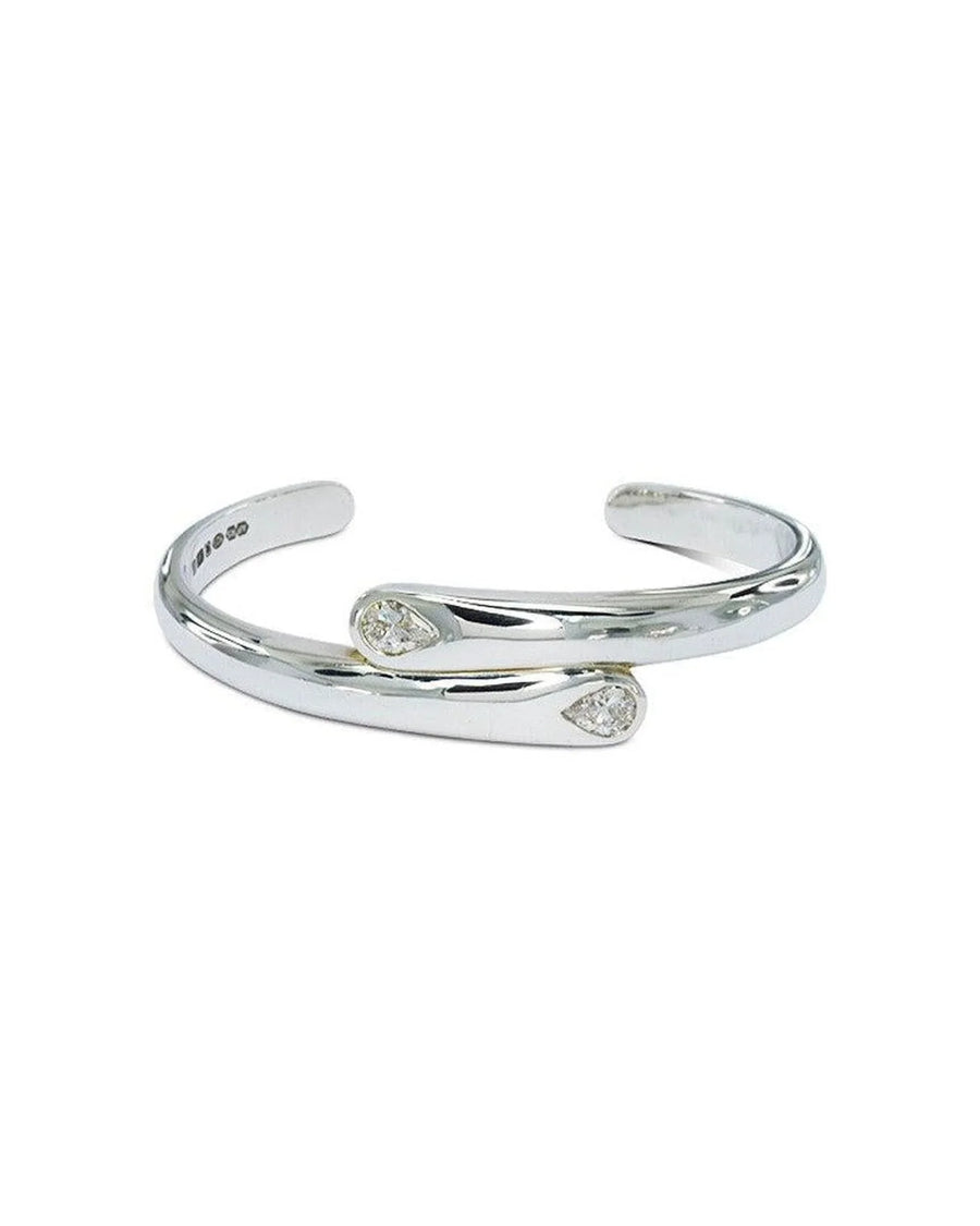 Open silver cuff bangle with two pear-shaped diamonds on each end, minimalist design