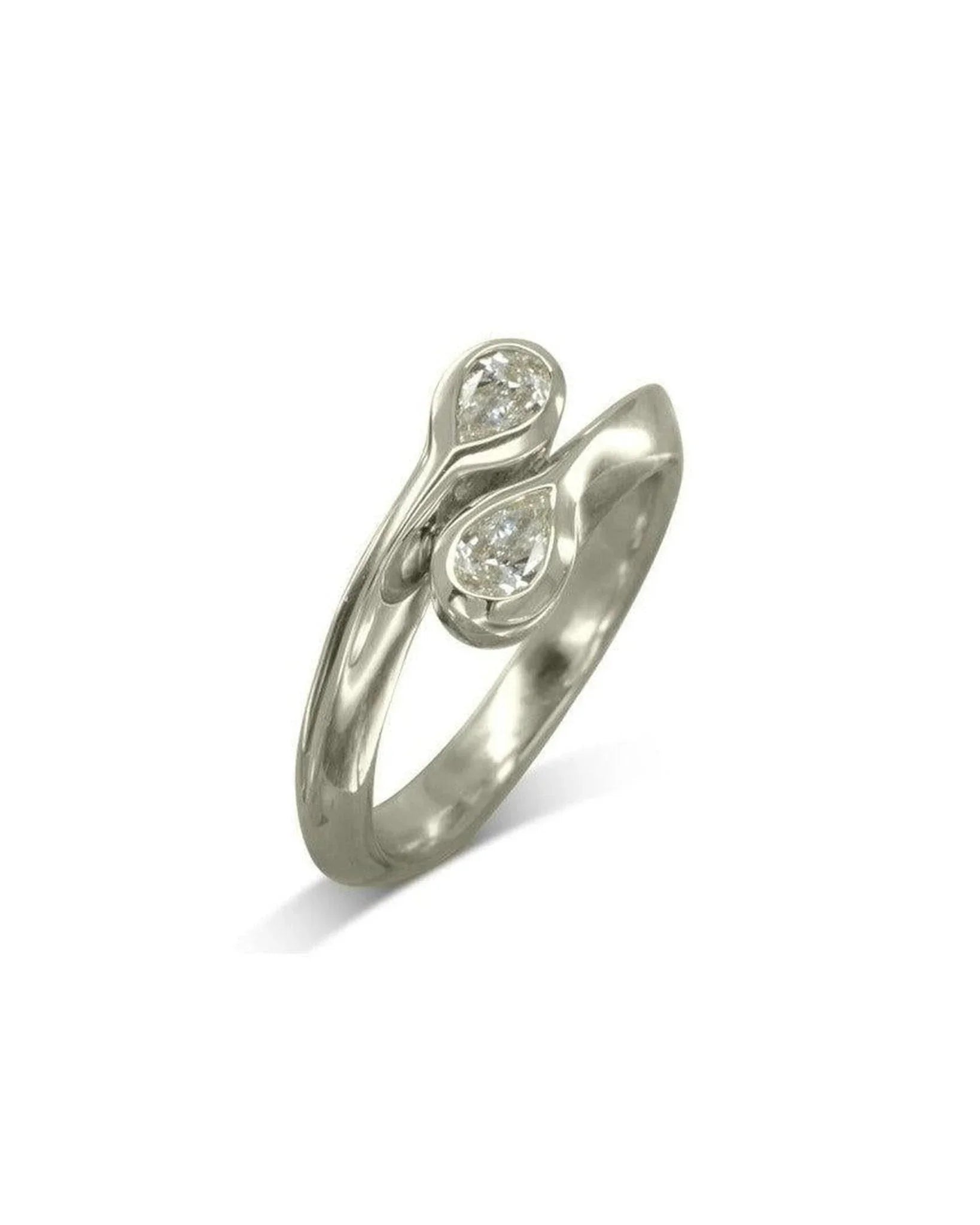 Platinum diamond ring with two pear-shaped diamonds in a bypass design.