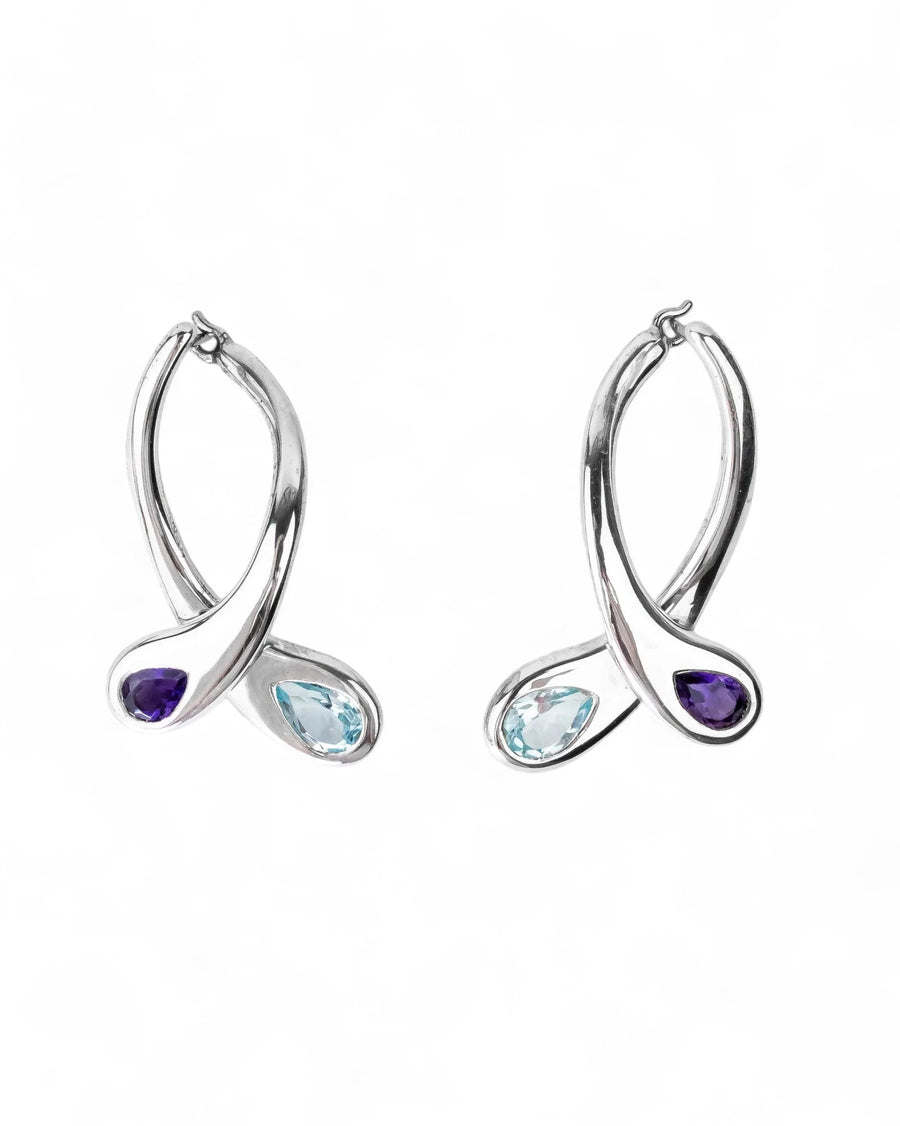 Sterling silver drop earrings with amethyst and blue topaz gemstones on a white background
