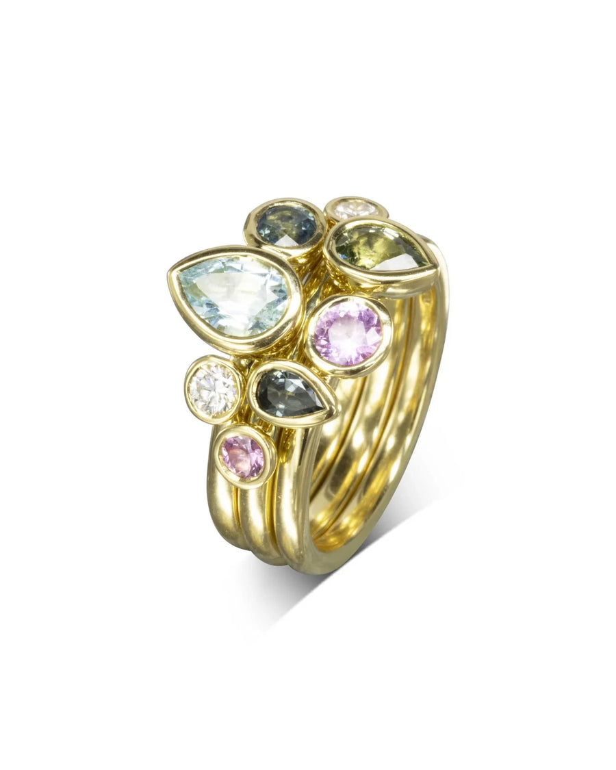 9ct yellow gold stacking ring set with multi-coloured aquamarine and sapphire pear gemstones.