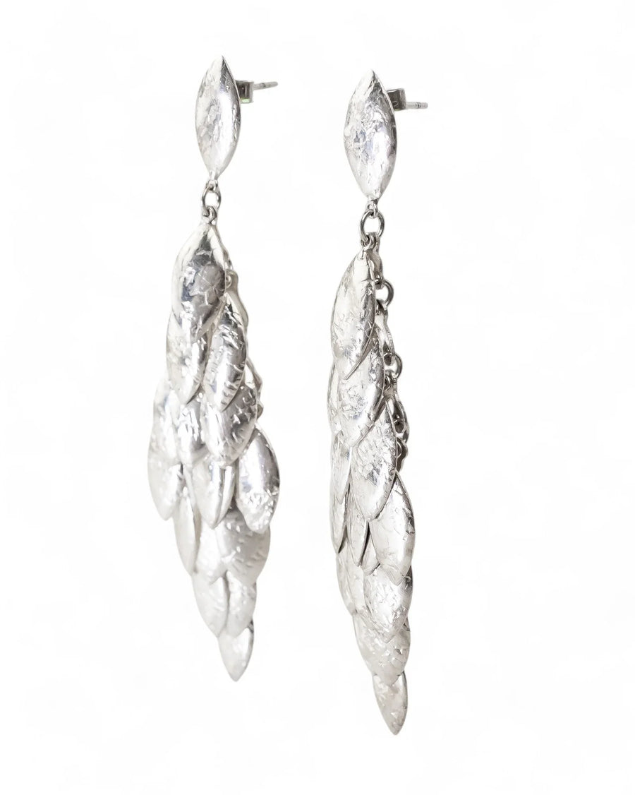 Silver multi-leaf long drop earrings with textured finish.