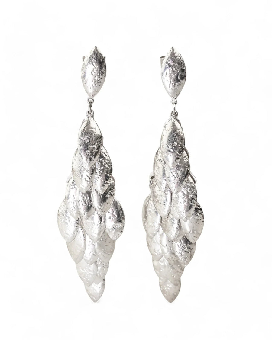 Silver multi-leaf long drop earrings with textured finish.