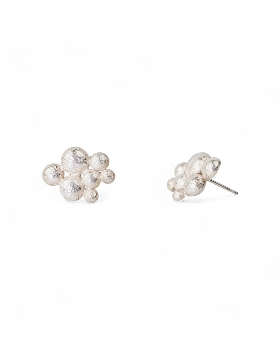 Silver multi nugget stud earrings with textured, organic shapes.