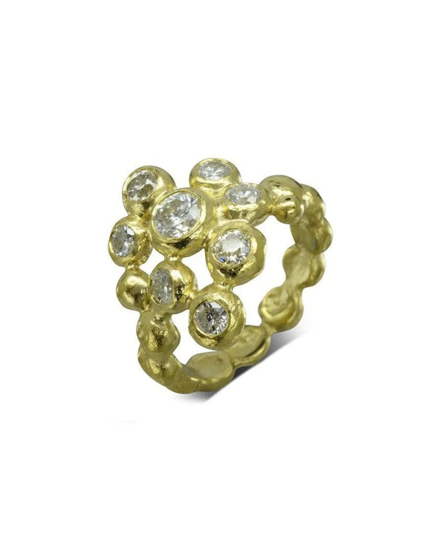 Gold nugget diamond cluster ring with multiple round diamonds.