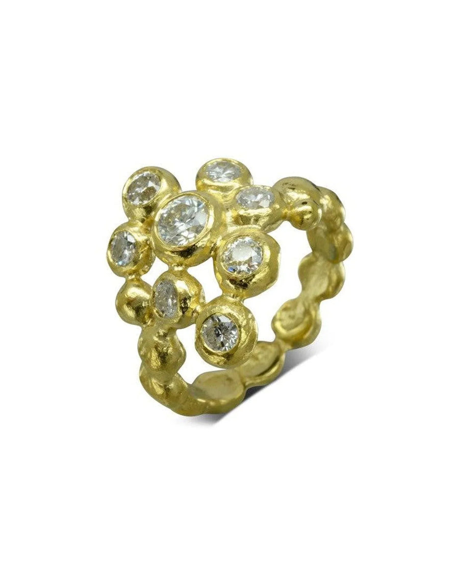 Gold nugget diamond cluster ring with multiple round diamonds.