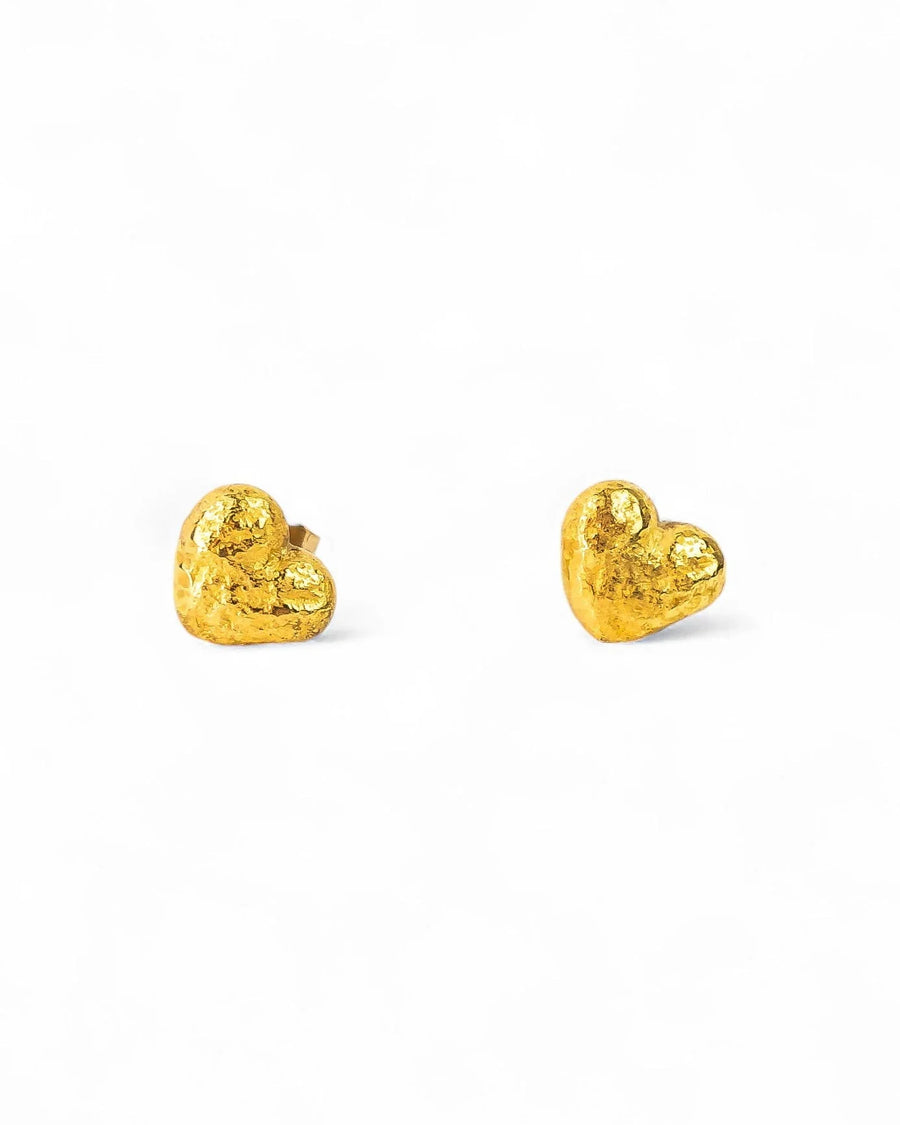 Nugget gold heart stud earrings with a textured finish.