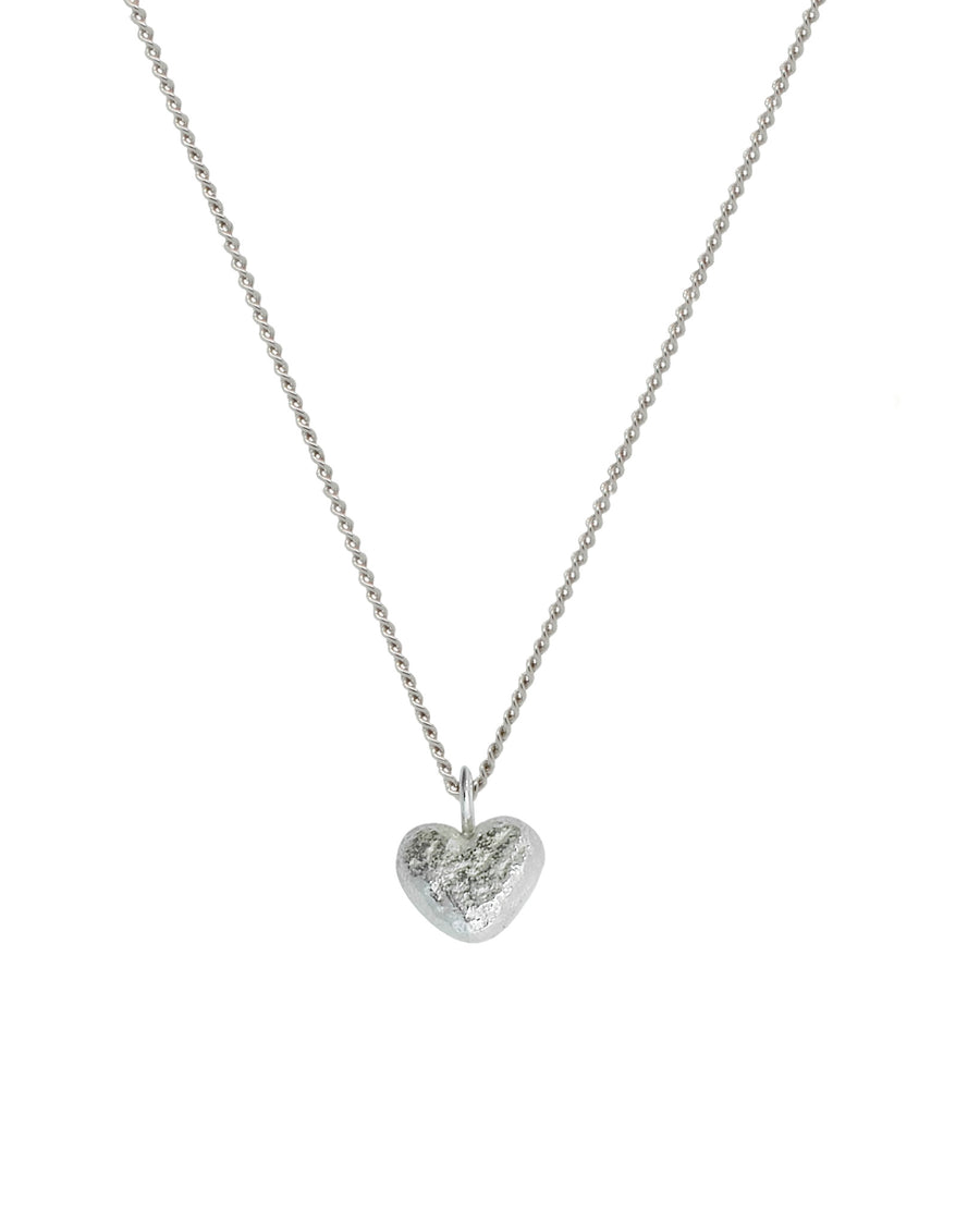 Silver nugget heart pendant on a delicate chain.