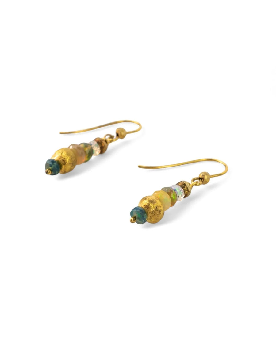 Dangly gold earrings with opal and textured organic gold beads on white background