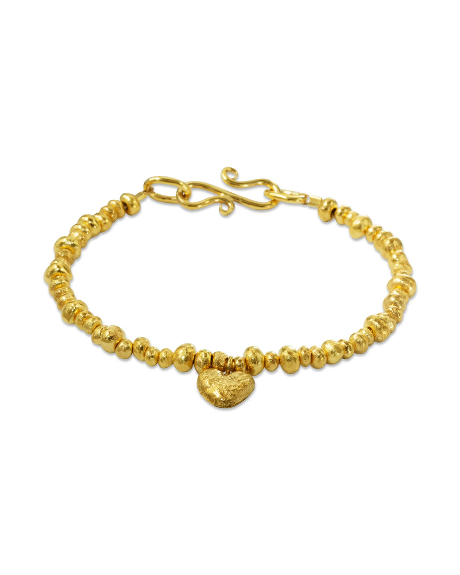Handmade gold nugget bracelet with organic beads and heart charm, luxury jewellery