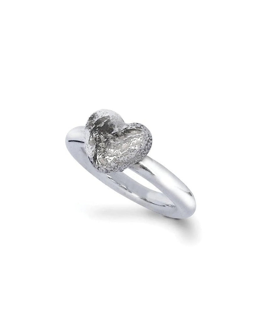 Silver ring featuring a textured nugget heart on a polished band.