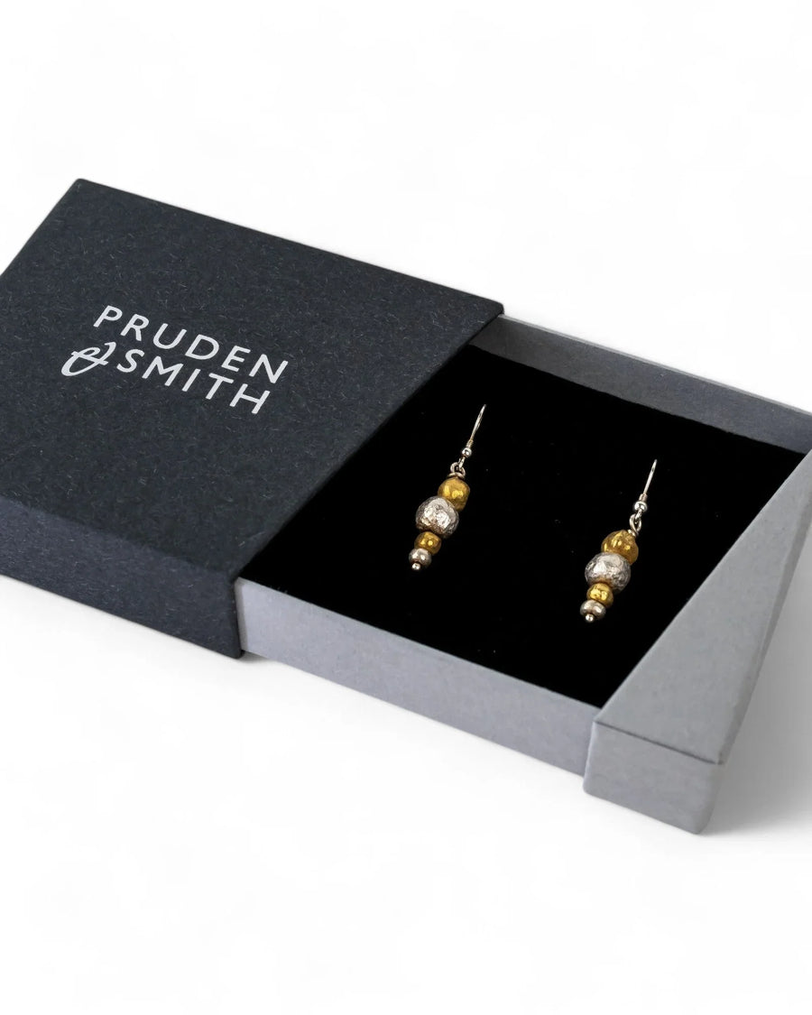 Gold and silver nugget drop earrings with organic texture in a gift box