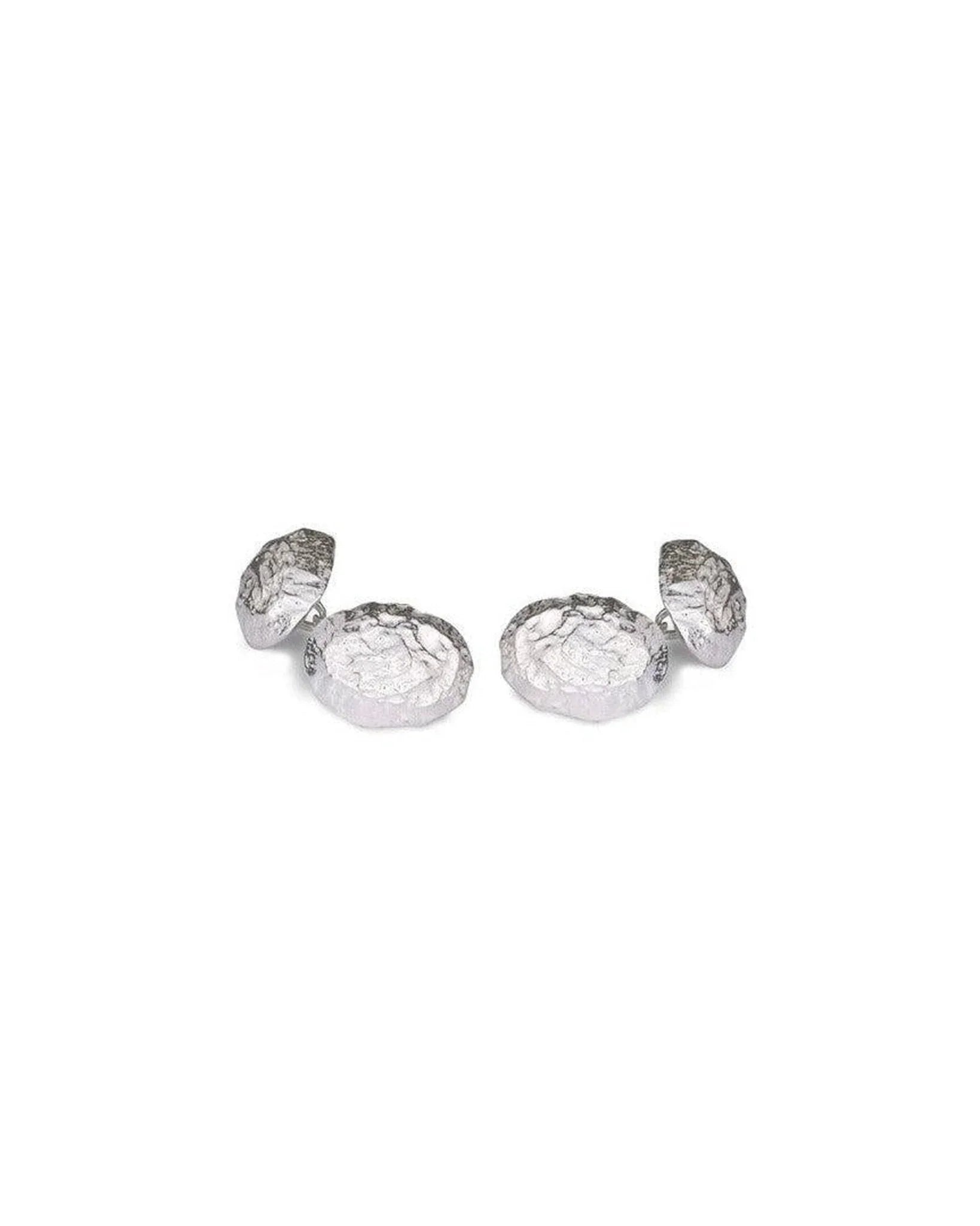 Silver nugget clip cufflinks with an organic, textured design.