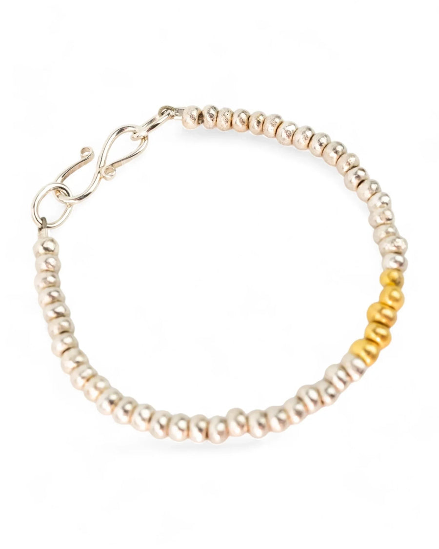 Handmade silver beaded bracelet with a section of gold beads and a hook clasp
