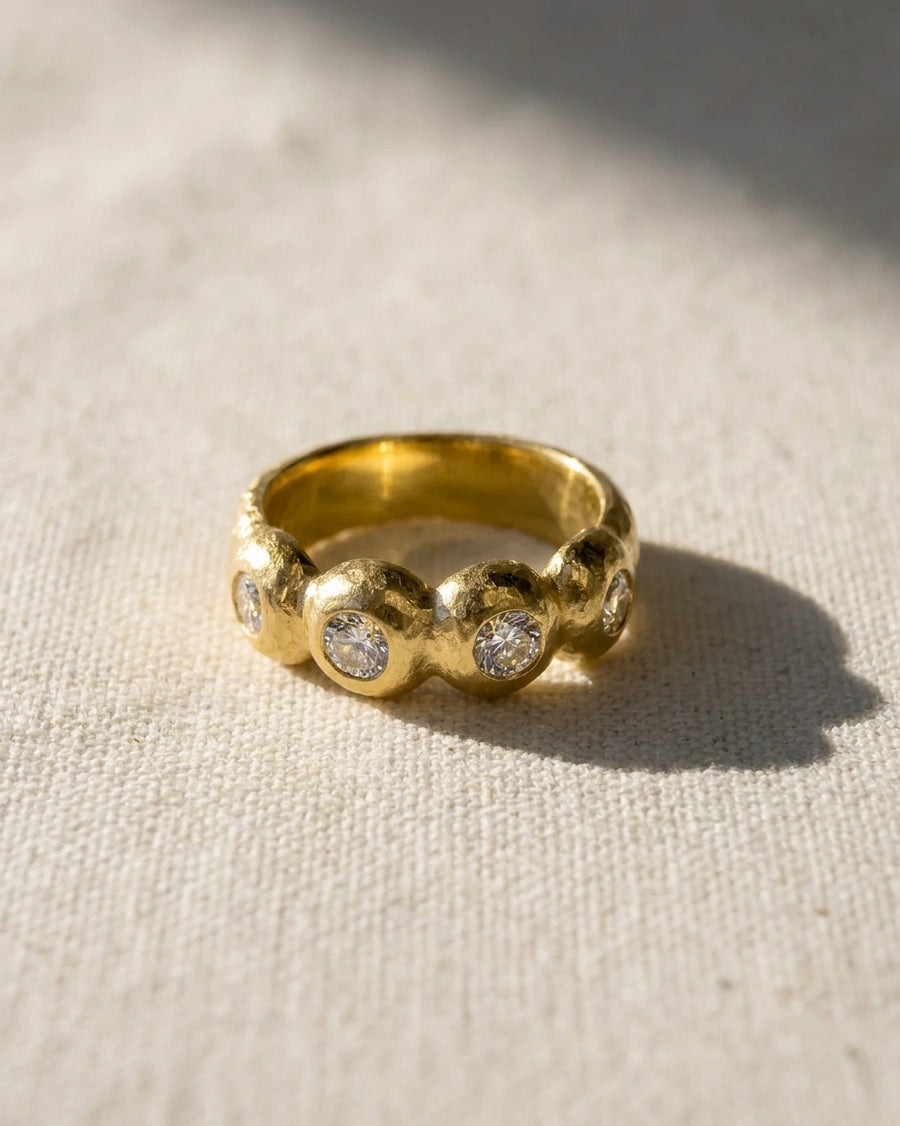 9ct yellow gold eternity ring with six round diamonds.