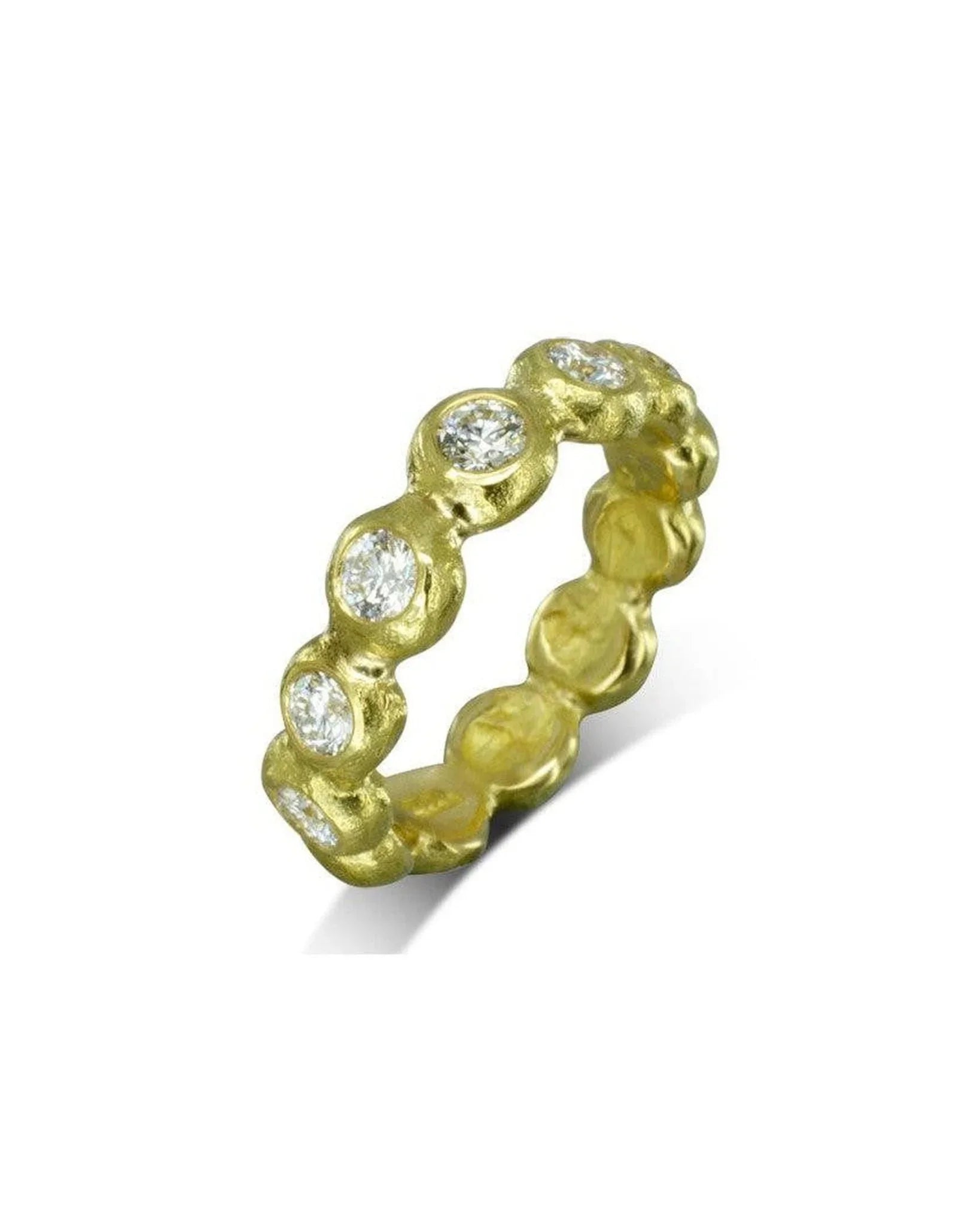 Nugget yellow gold full eternity ring with bezel-set diamonds.