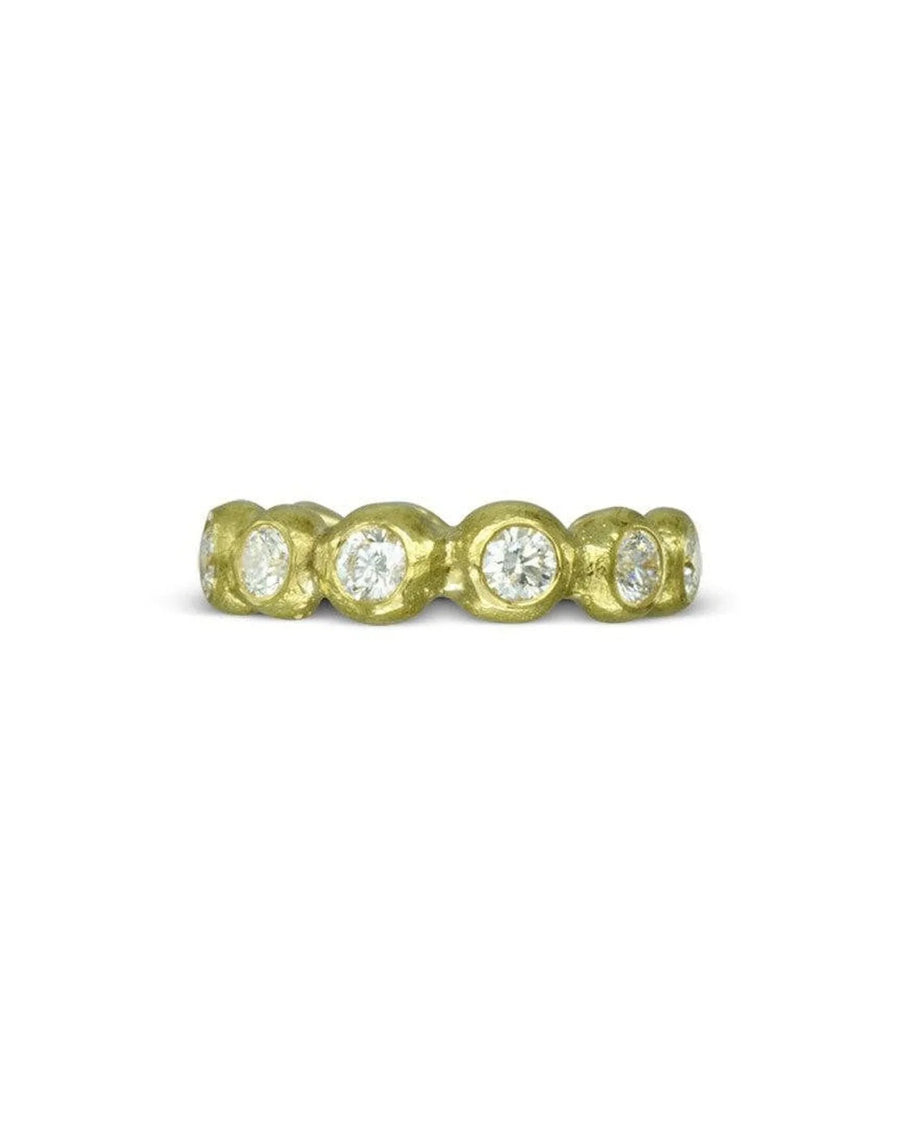 Nugget yellow gold diamond full eternity ring with bezel-set diamonds.