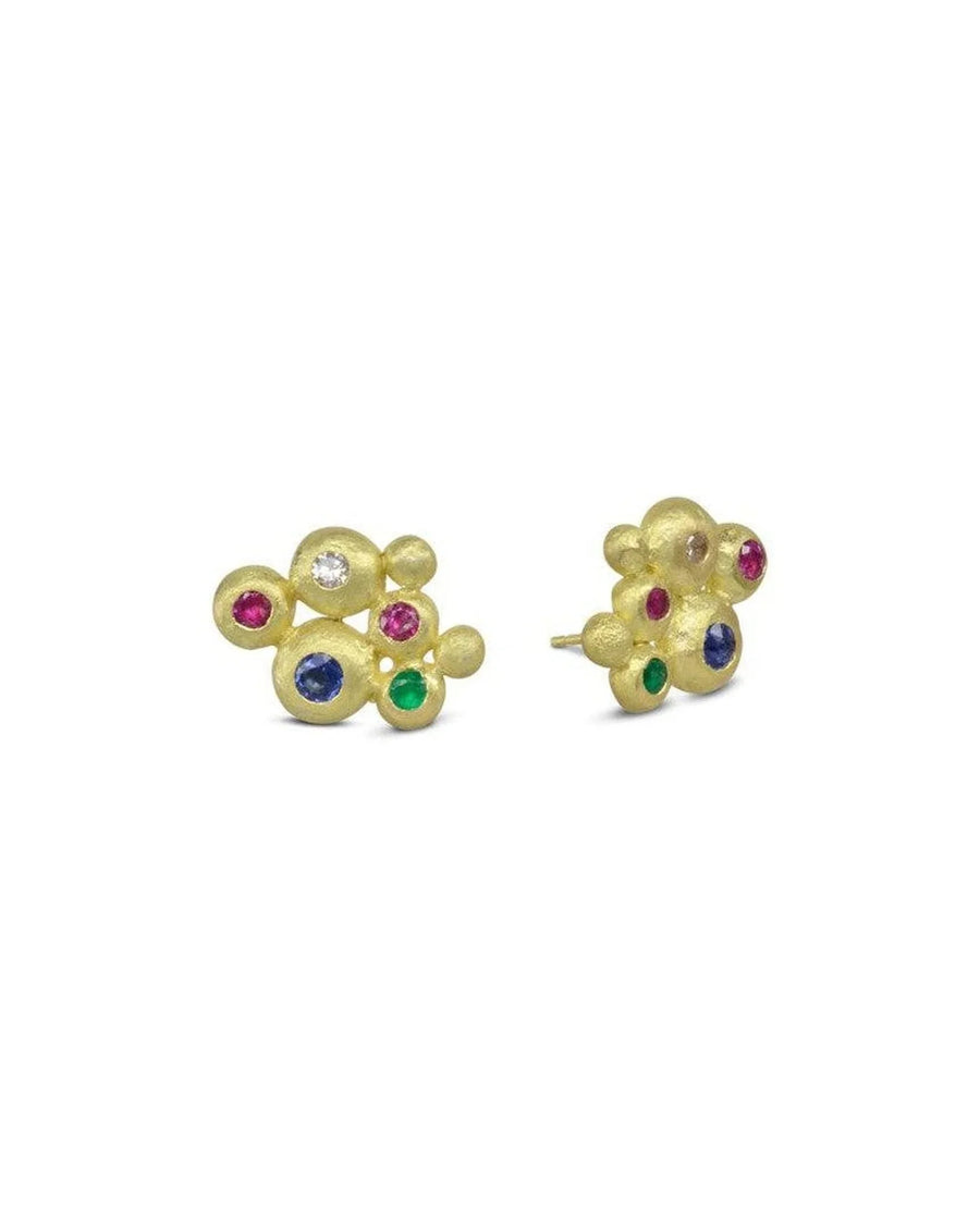 Gold stud earrings with organic shapes, set with ruby, emerald, sapphire, and diamond stones