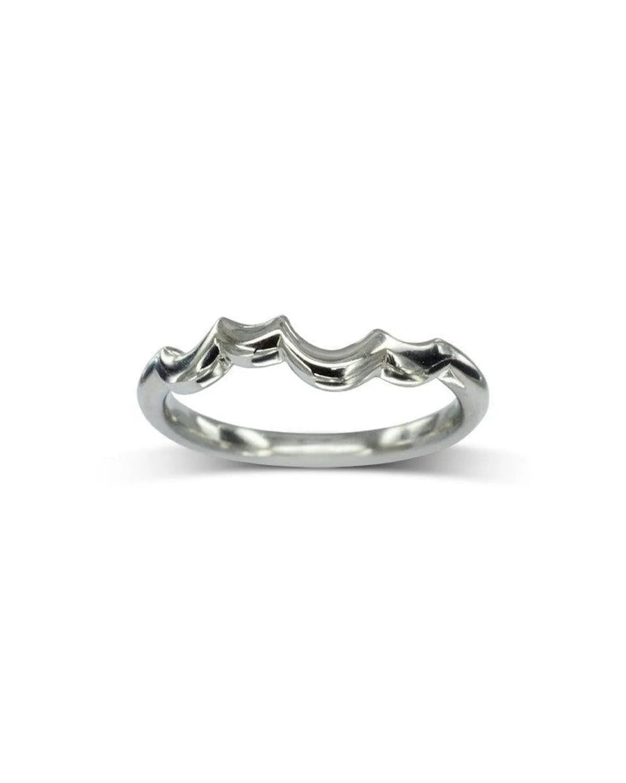 Platinum engagement ring with an offset old cut diamond design.