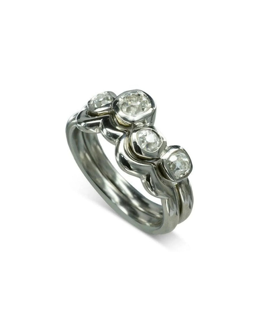 Platinum engagement ring and fitted wedding ring set with old cut diamonds.