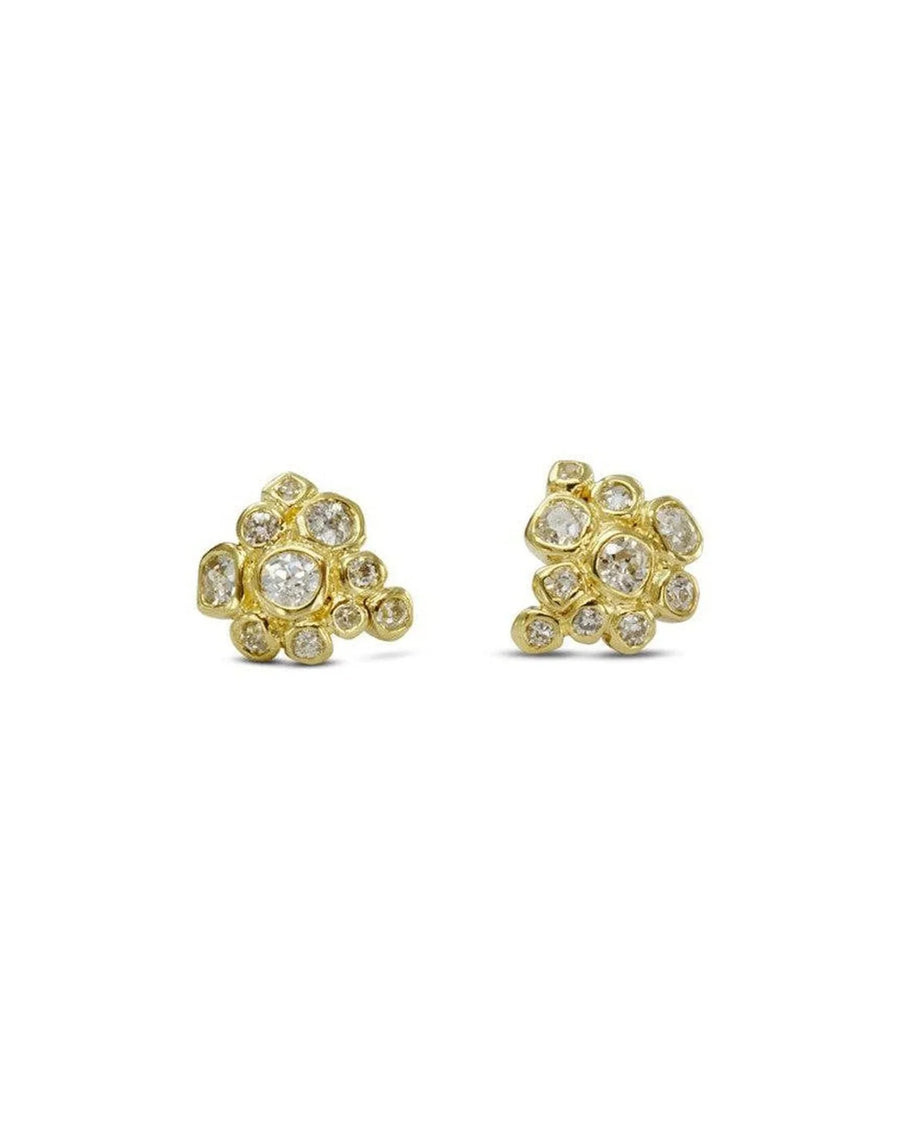 Gold cluster stud earrings with old cut diamonds.