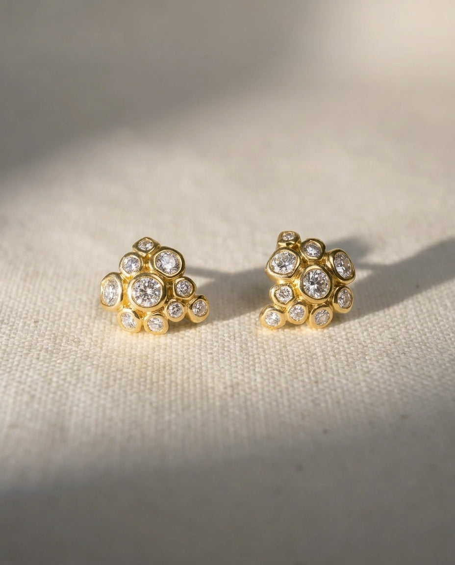 9ct yellow gold old cut diamond cluster stud earrings.