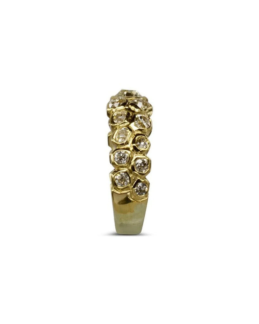 Gold eternity ring with two rows of old cut diamonds.
