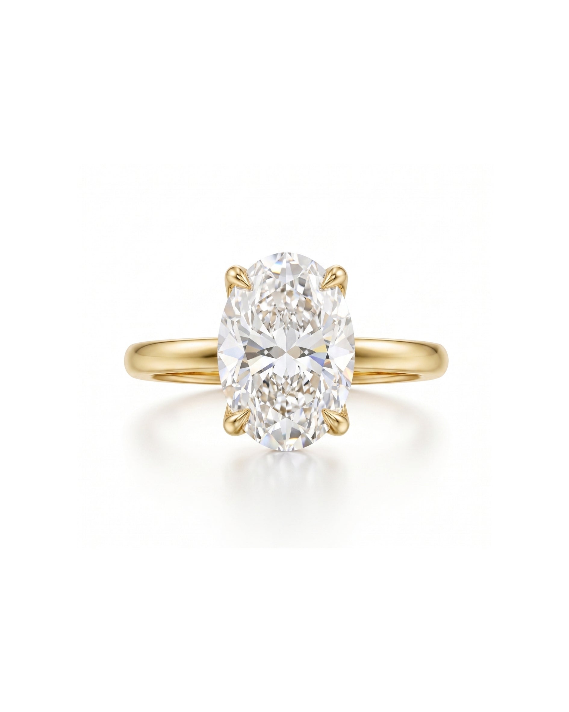 Yellow gold solitaire engagement ring with an oval diamond.