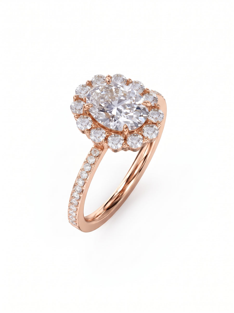 Rose gold oval cut diamond ring with a claw set halo and pavé diamond band.
