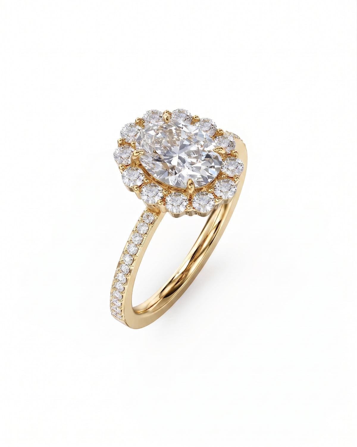 Oval cut diamond ring with a halo setting and pavé diamonds on a yellow gold band.