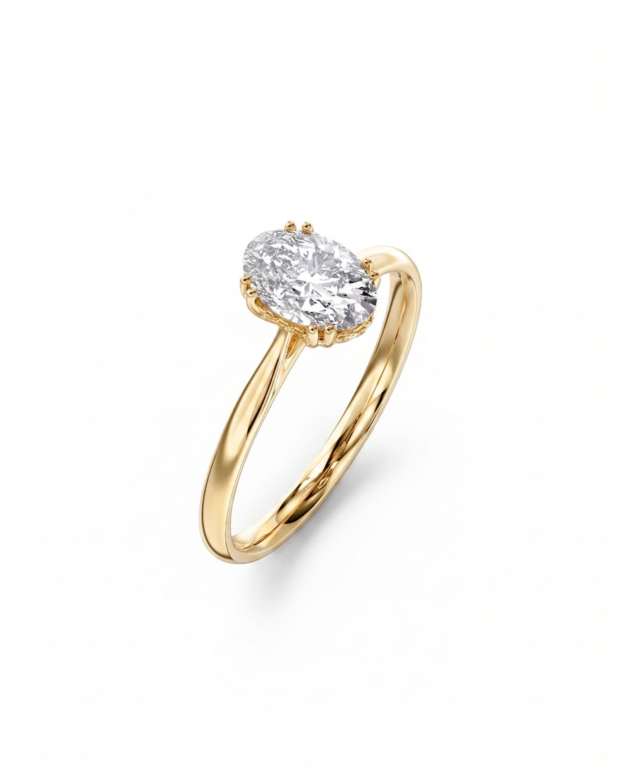 18ct yellow gold engagement ring with a 1ct oval cut lab grown diamond.