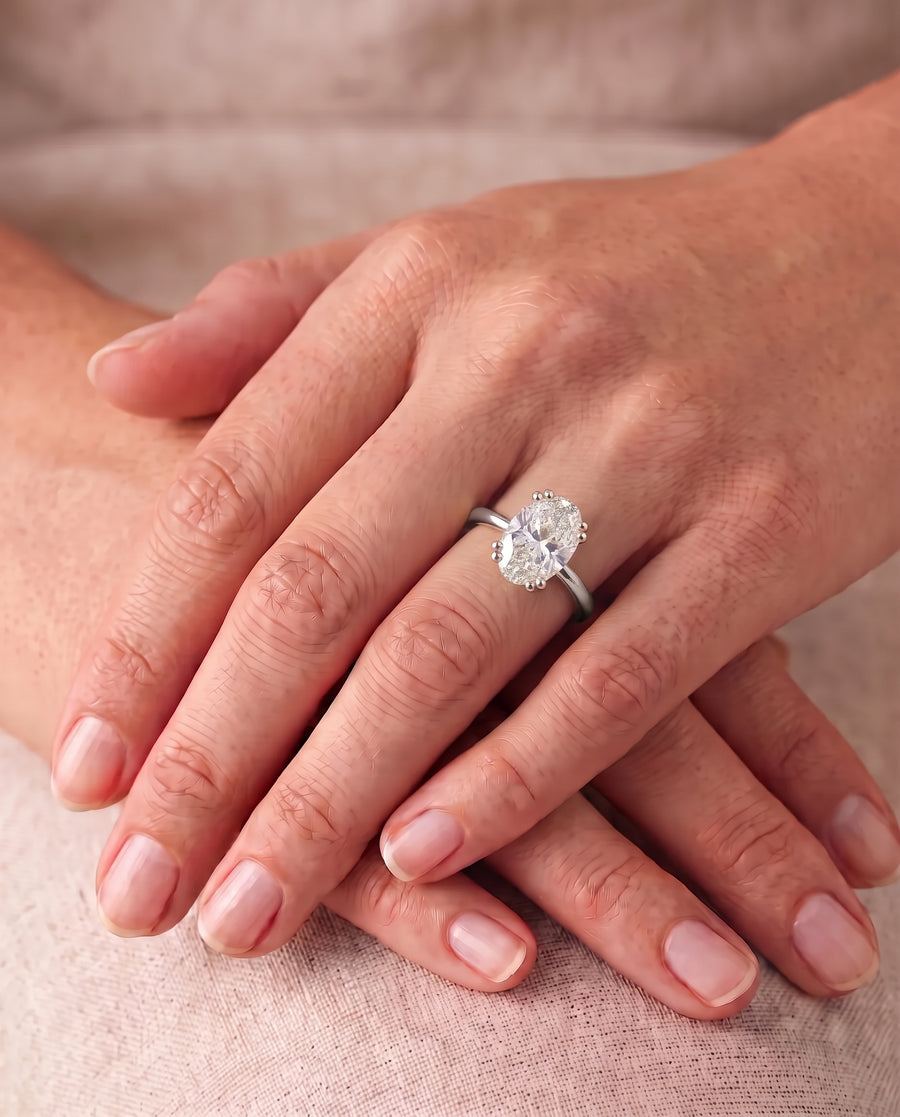 Oval Cut Hidden Halo Engagement Ring