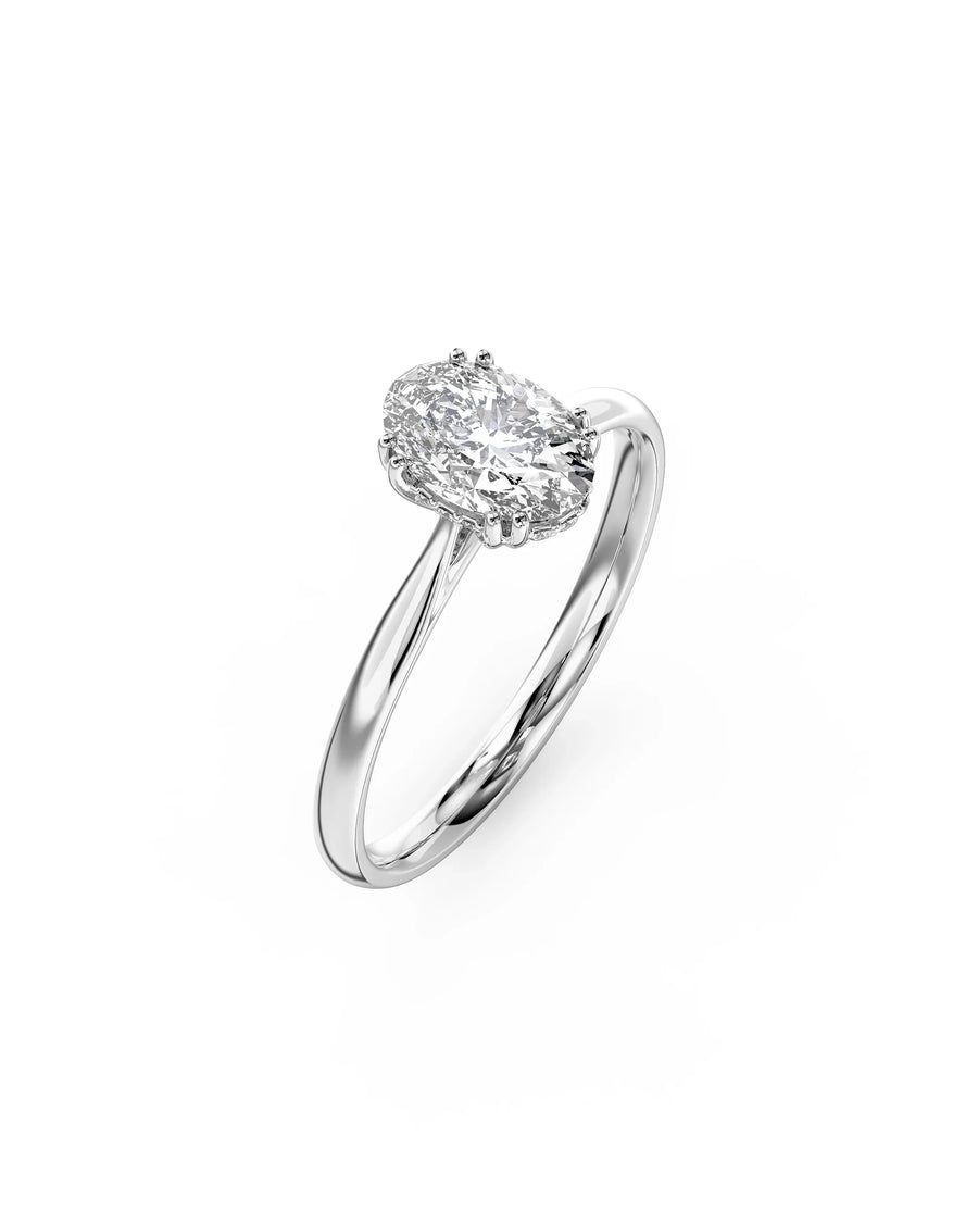 Platinum oval cut hidden halo engagement ring with a 1ct lab grown diamond.