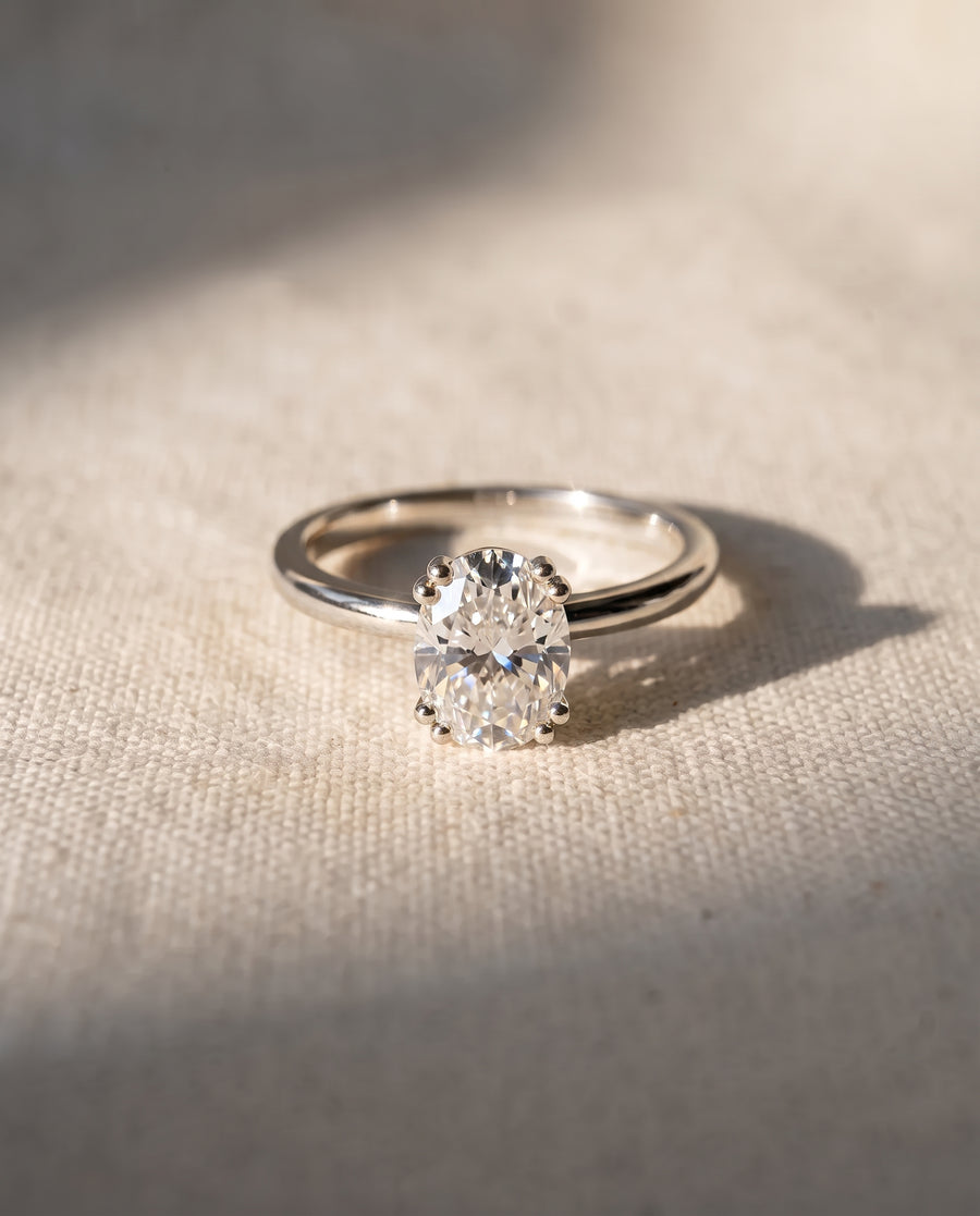 Oval Cut Hidden Halo Engagement Ring