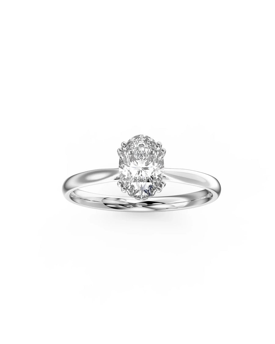 platinum Silver engagement ring with an oval cut diamond and hidden halo.