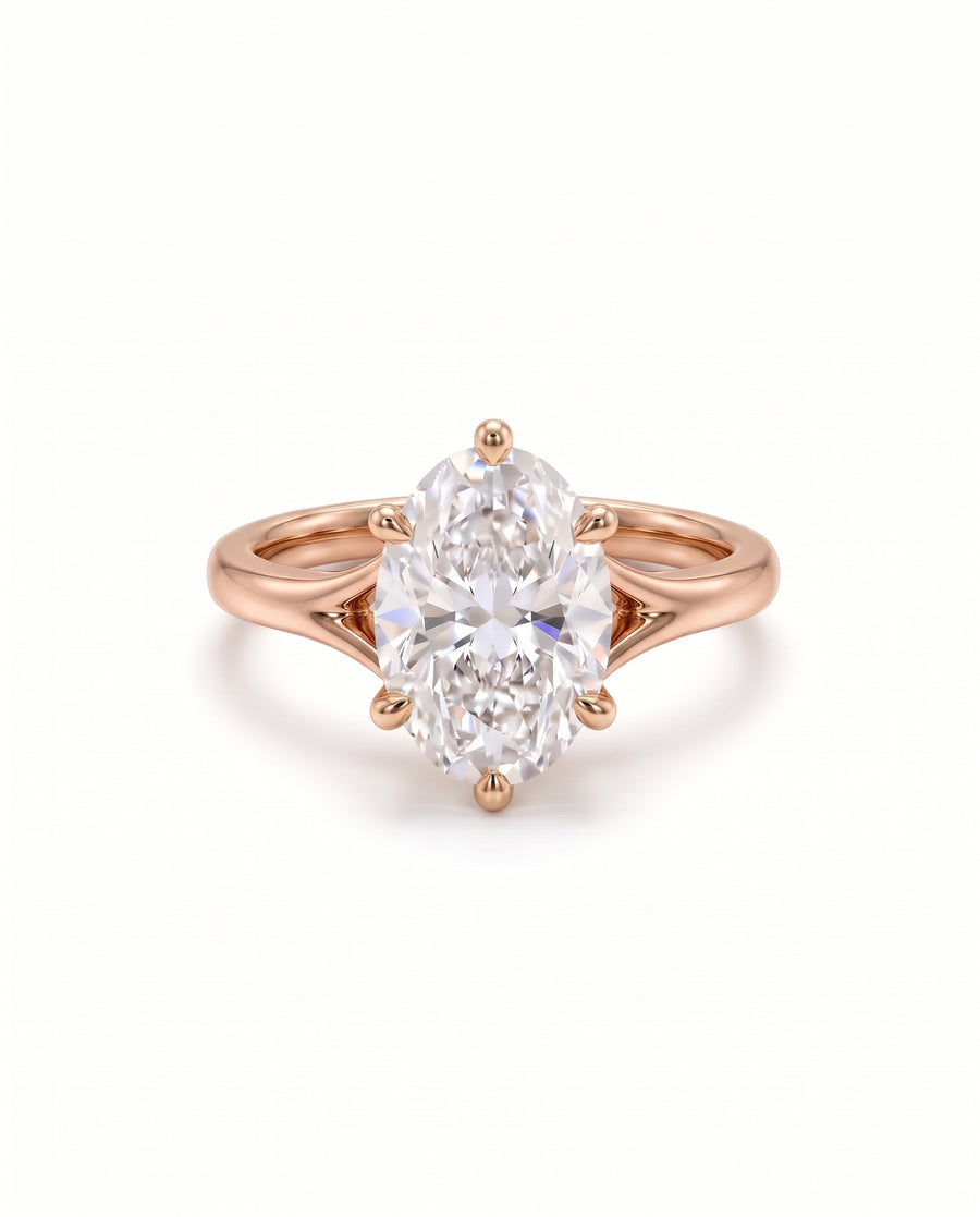 Oval cut diamond engagement ring in 18ct rose gold with a tulip claw setting.