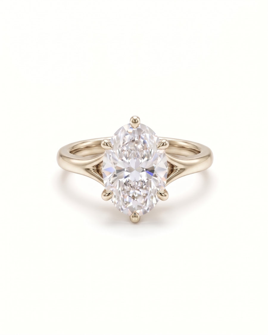 Oval cut diamond engagement ring in 9ct white gold with a tulip claw setting.