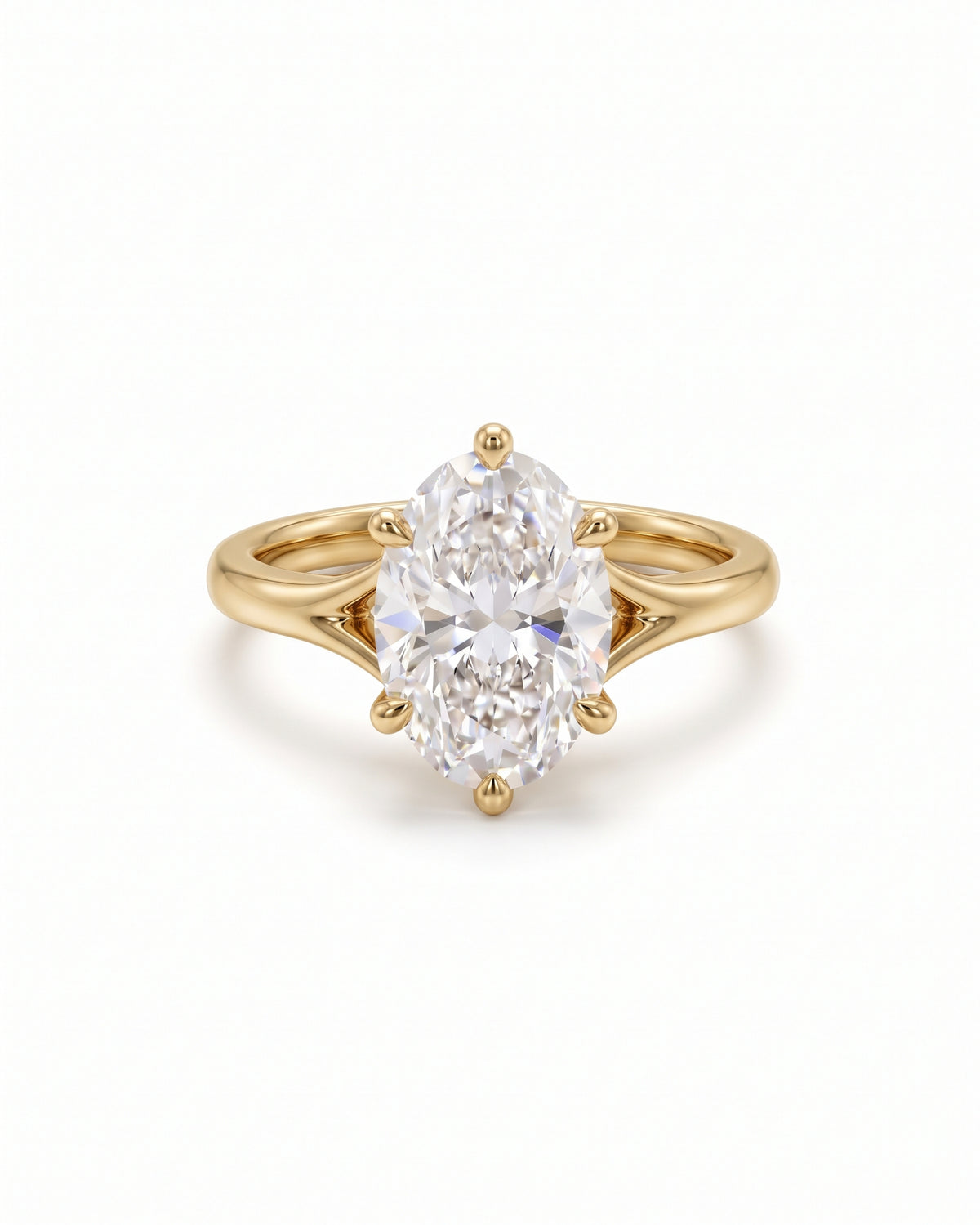 Oval cut diamond engagement ring in 18ct yellow gold with a tulip claw setting.