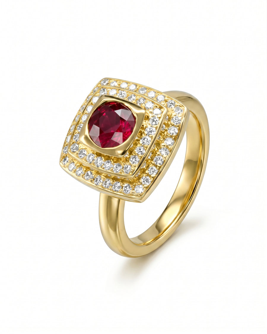 Yellow gold ring with a square ruby and diamond cluster.