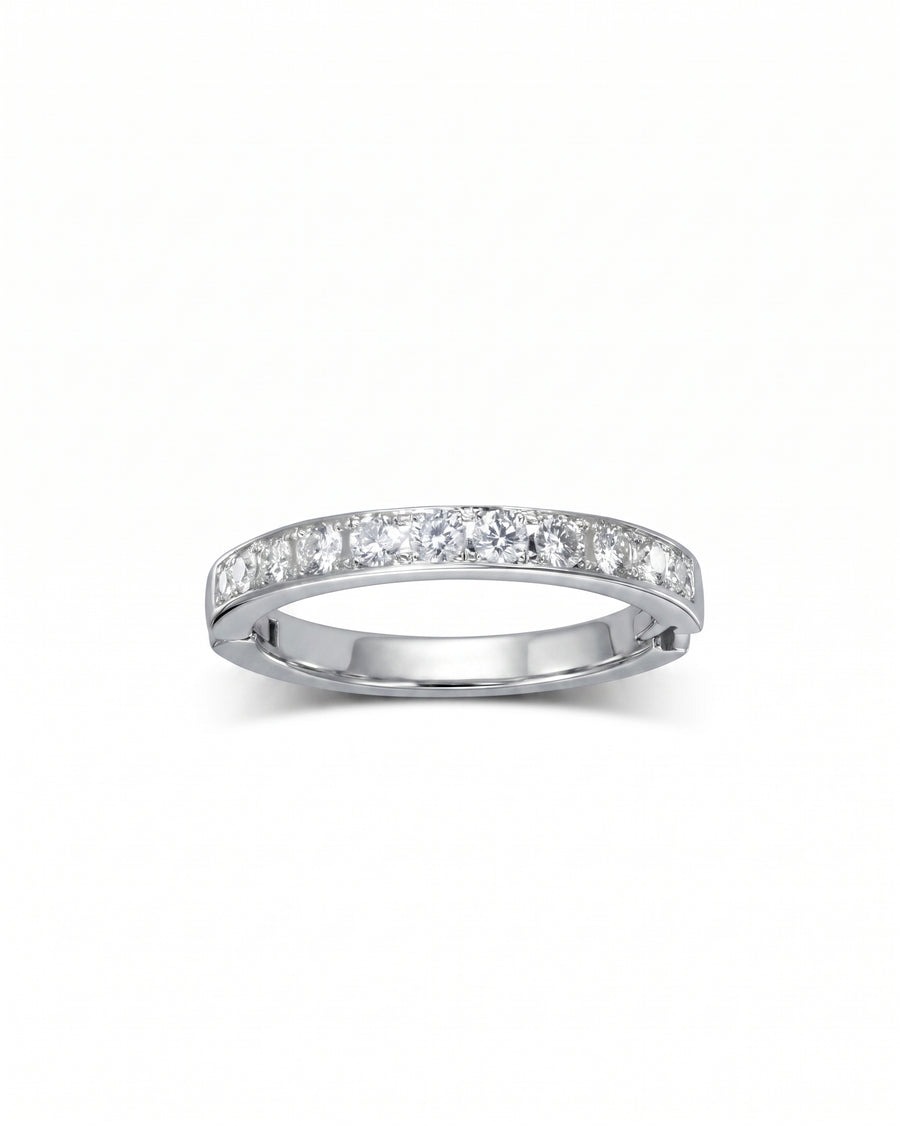 Silver pavé diamond hinged ring with a row of round diamonds.