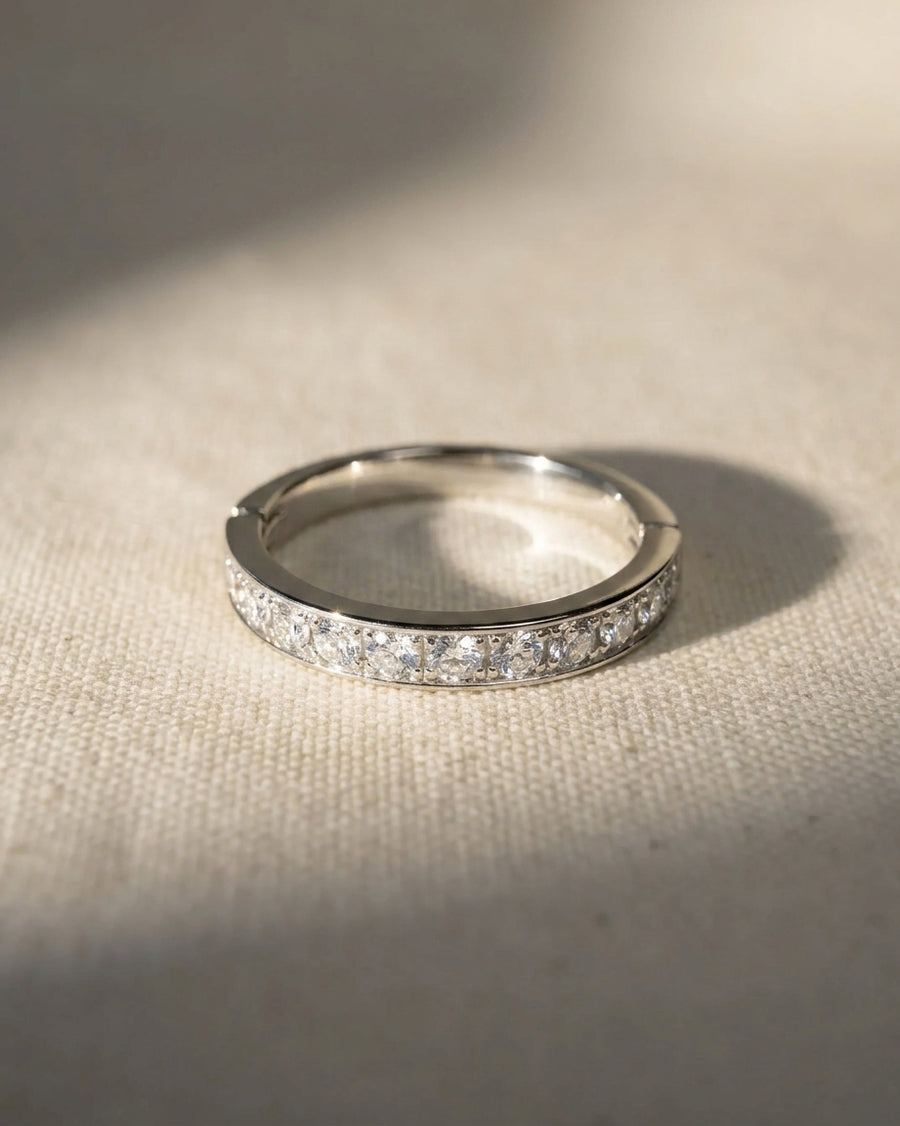 Platinum hinged ring with pavé diamonds.