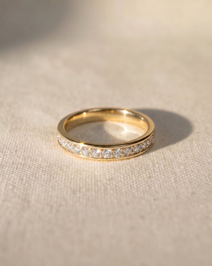 18ct yellow gold full eternity ring with 2mm pavé diamonds.