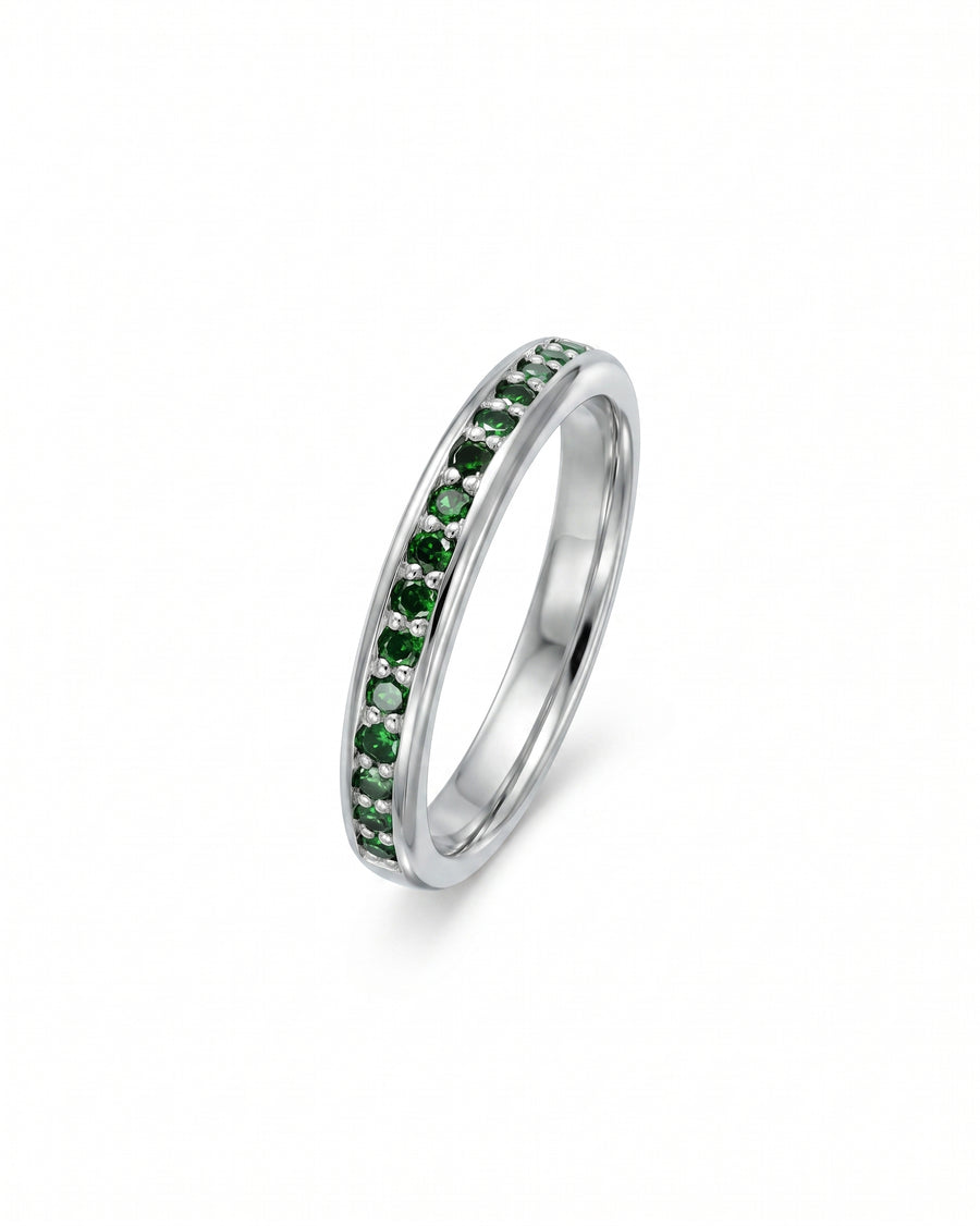 Platinum ring with pavé green diamonds.