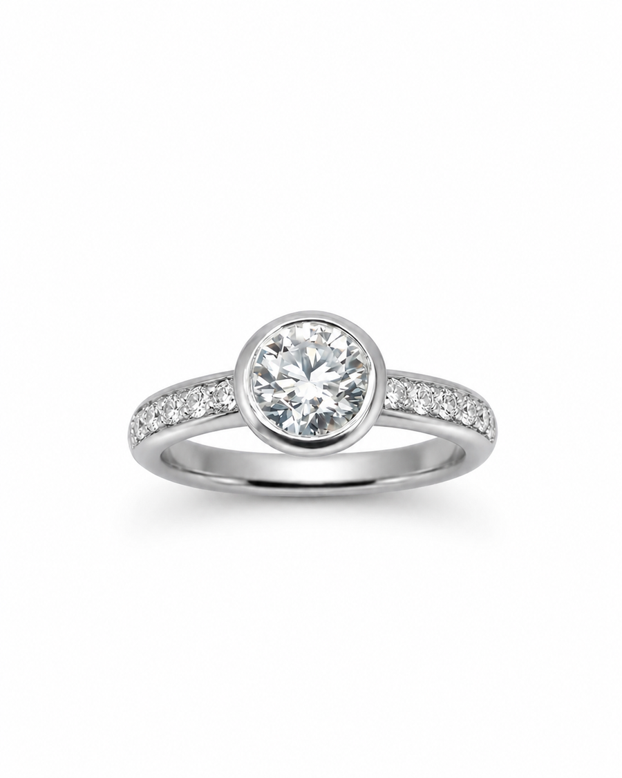 White gold pavé rub over diamond engagement ring.