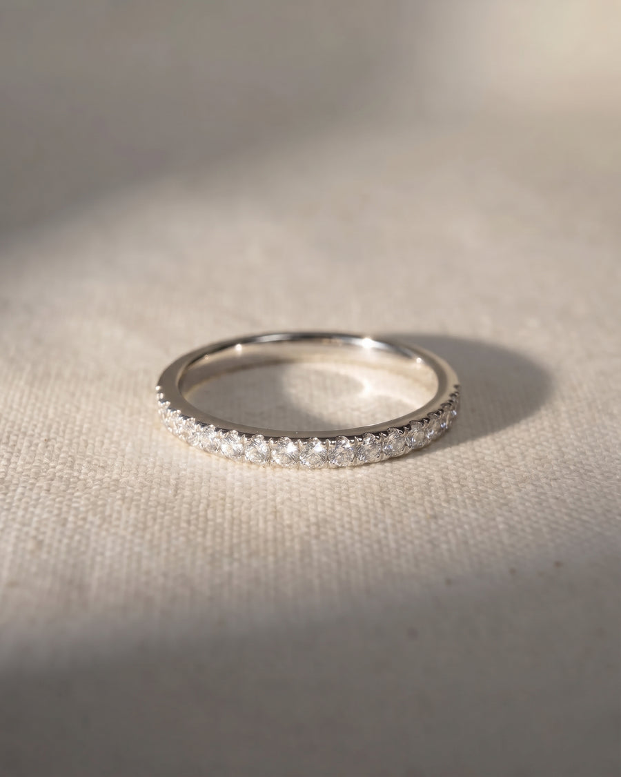 Slim platinum pavé set diamond ring.