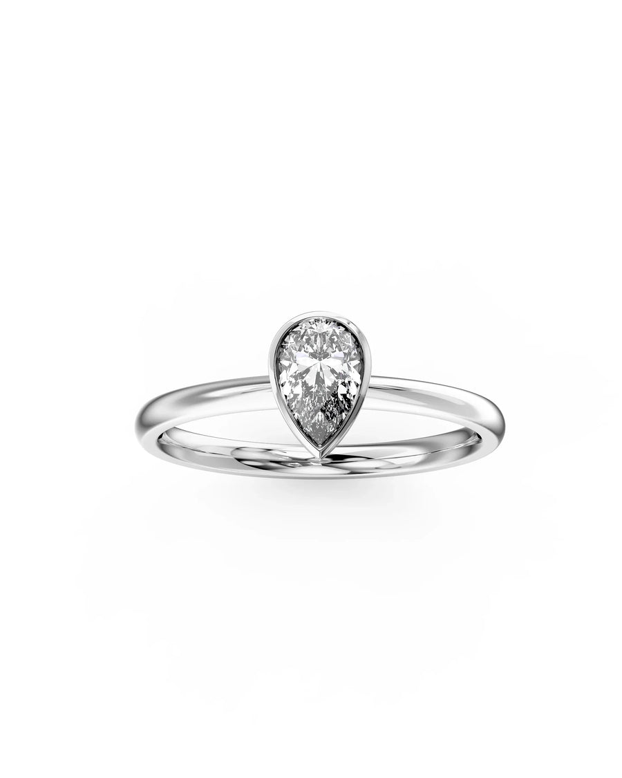 Silver pear cut bezel engagement ring with a single diamond.