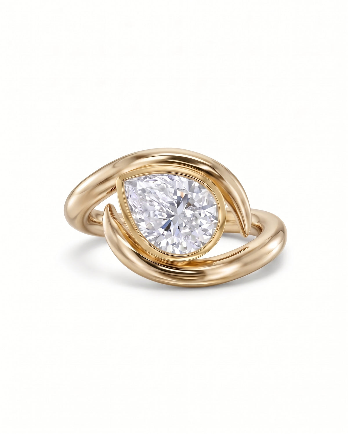 Pear cut diamond engagement ring in 18ct yellow gold with a spiky, wrap-around band design.
