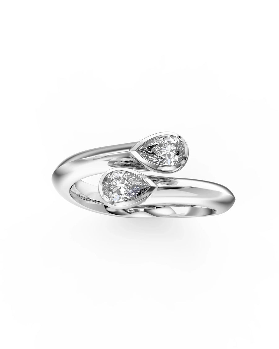 Silver toi et moi ring with two pear-cut diamonds.