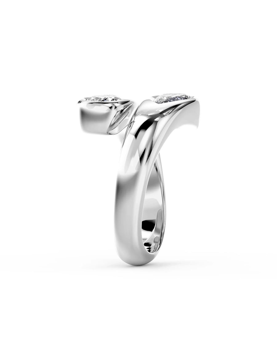 White gold pear cut toi et moi engagement ring with two diamonds.