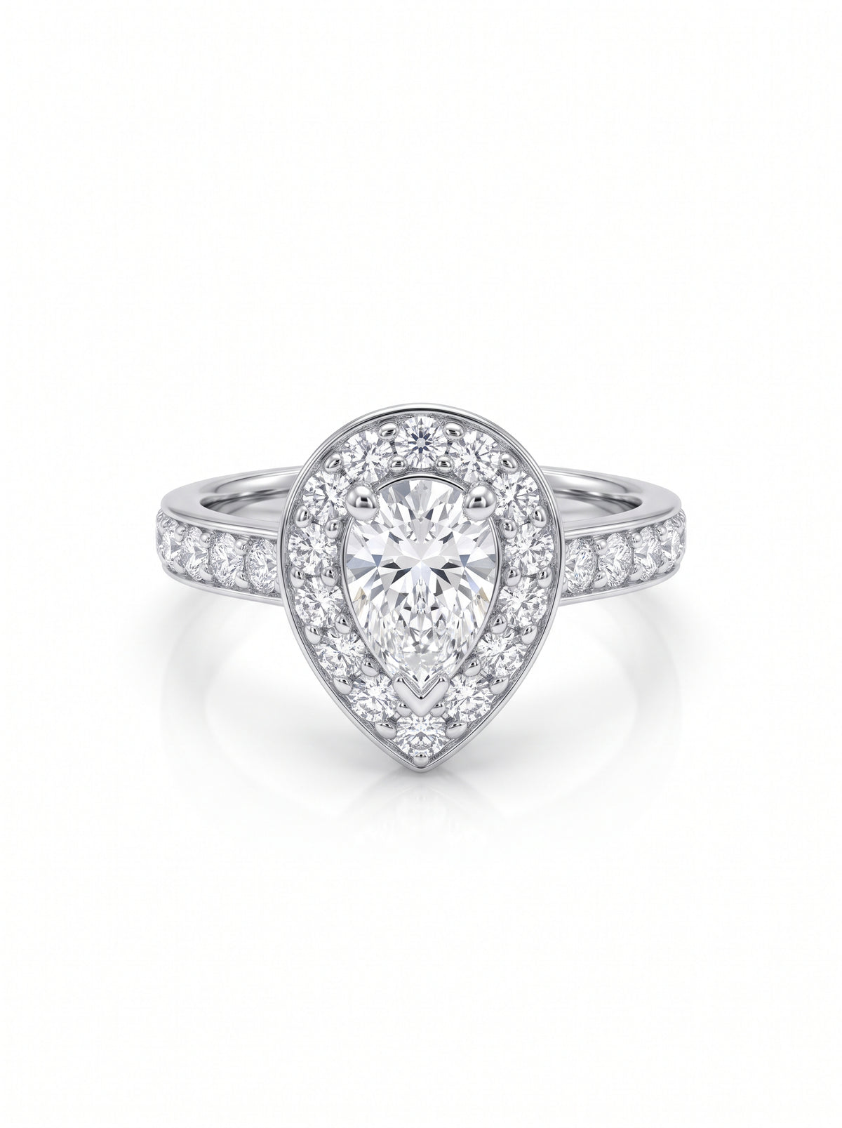 Pear shaped diamond cluster engagement ring in white gold with pavé set diamonds on the band.